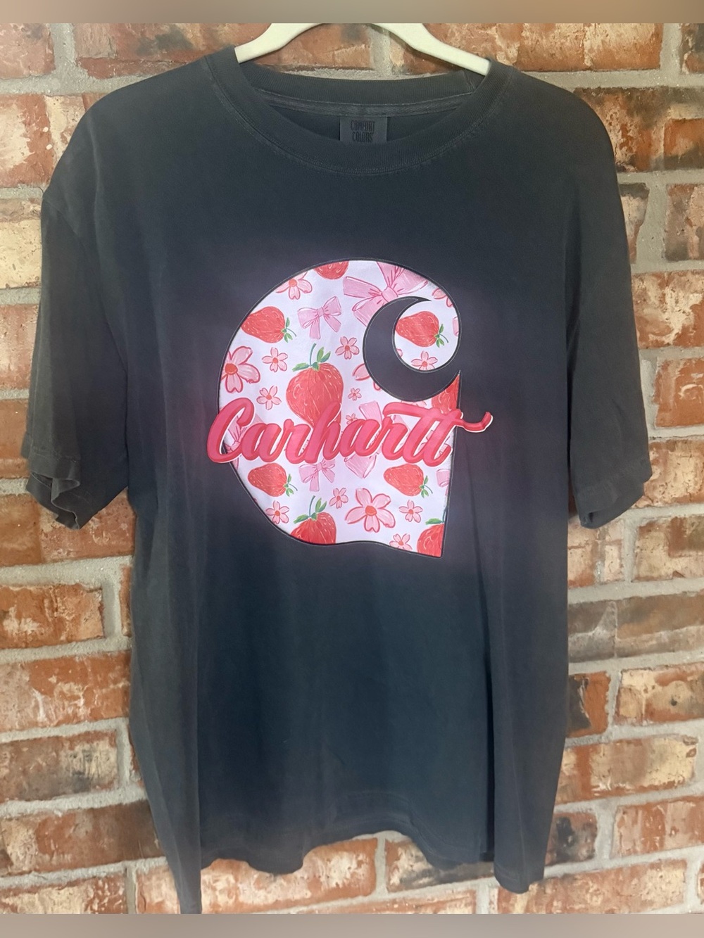 Comfort Colors Pepper Short Sleeve Tee with Pink Strawberry Logo